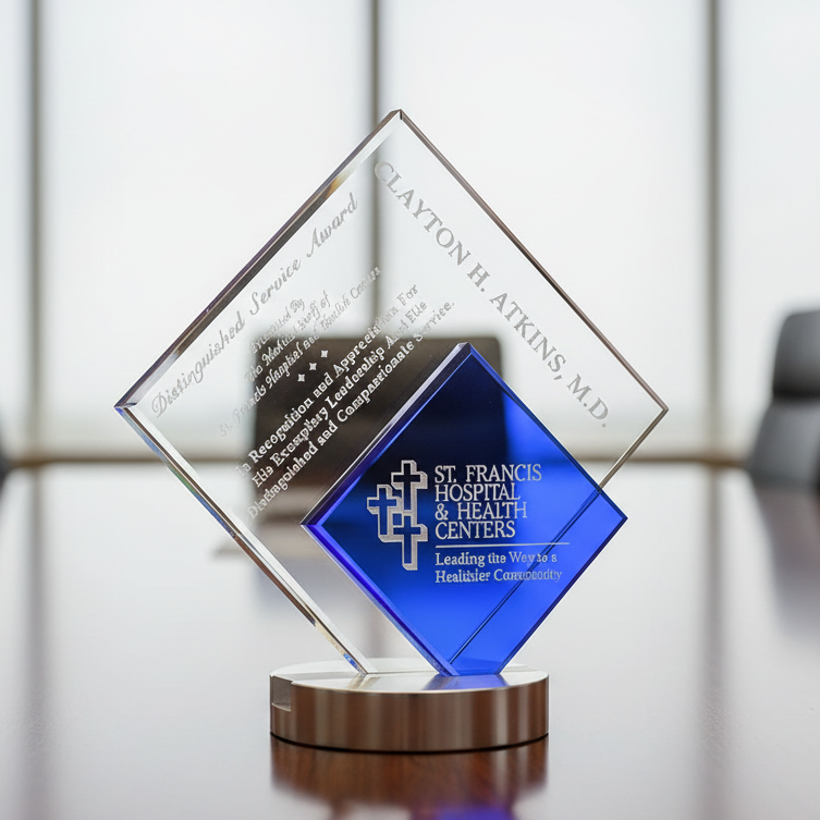Glass award with blue accent featuring St. Francis Hospital & Health Centers logo on a blurred background