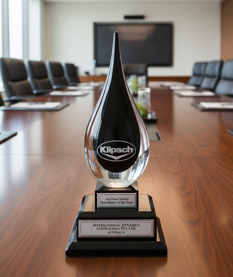 Crystal tear drop award with logo on on glass and a double base for engraving plates