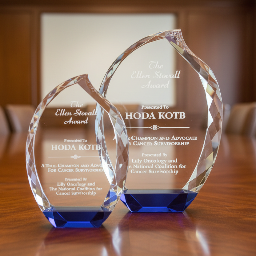 Faceted flame shaped crystal awards with blue accent and sand etch engraving