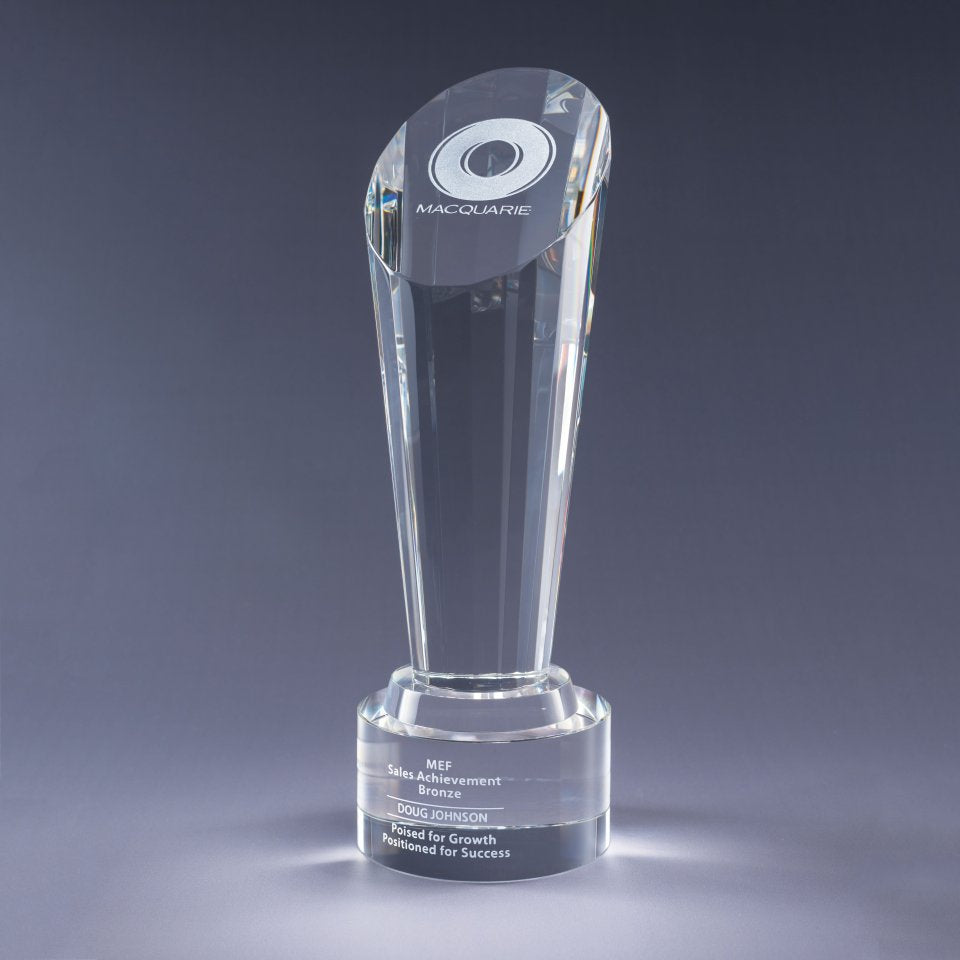 Clear Crystal glass award with sand etch engraved text and logo on a gray background