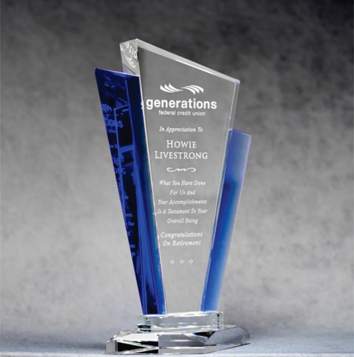 Elegant sand etch engraving optic crystal, with cobalt blue accents adding a touch of contrast.