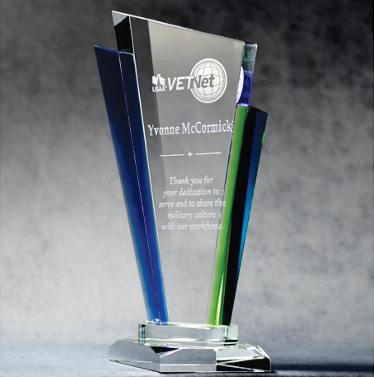 Optic crystal palace award with Blue/Green accents and sand etch engraving.