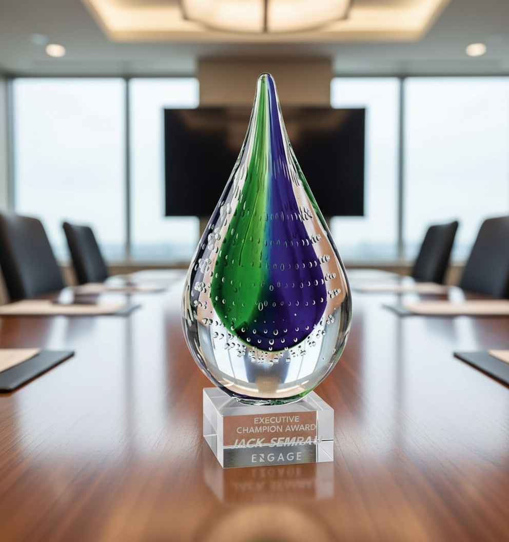 Decorative crystal glass award on a conference table with blurred background