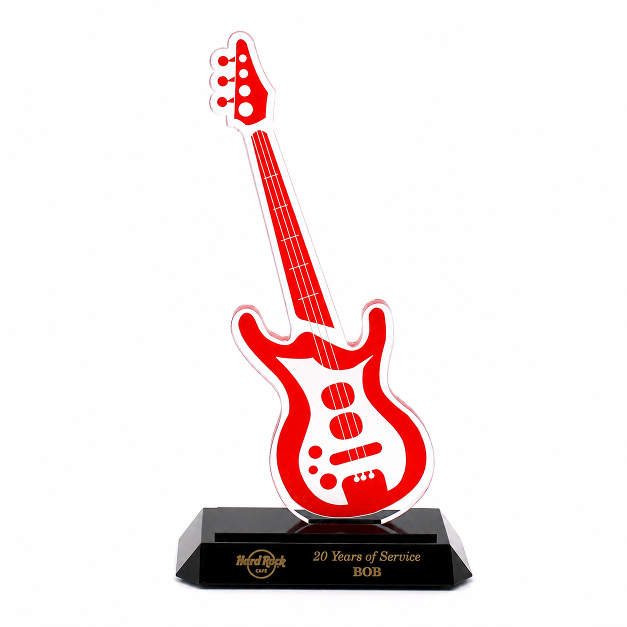 Red guitar-shaped acrylic trophy on a black base with engraved 'Hard Rock' branding
