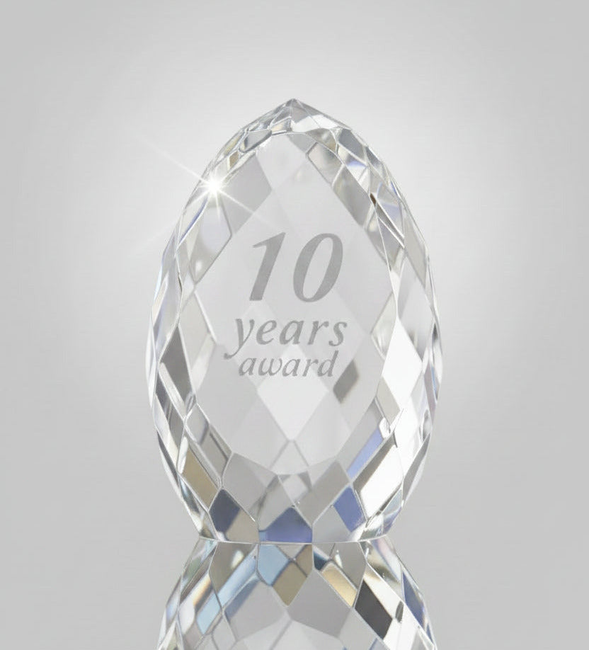 Crystal award with '10 years award' text on a gray background
