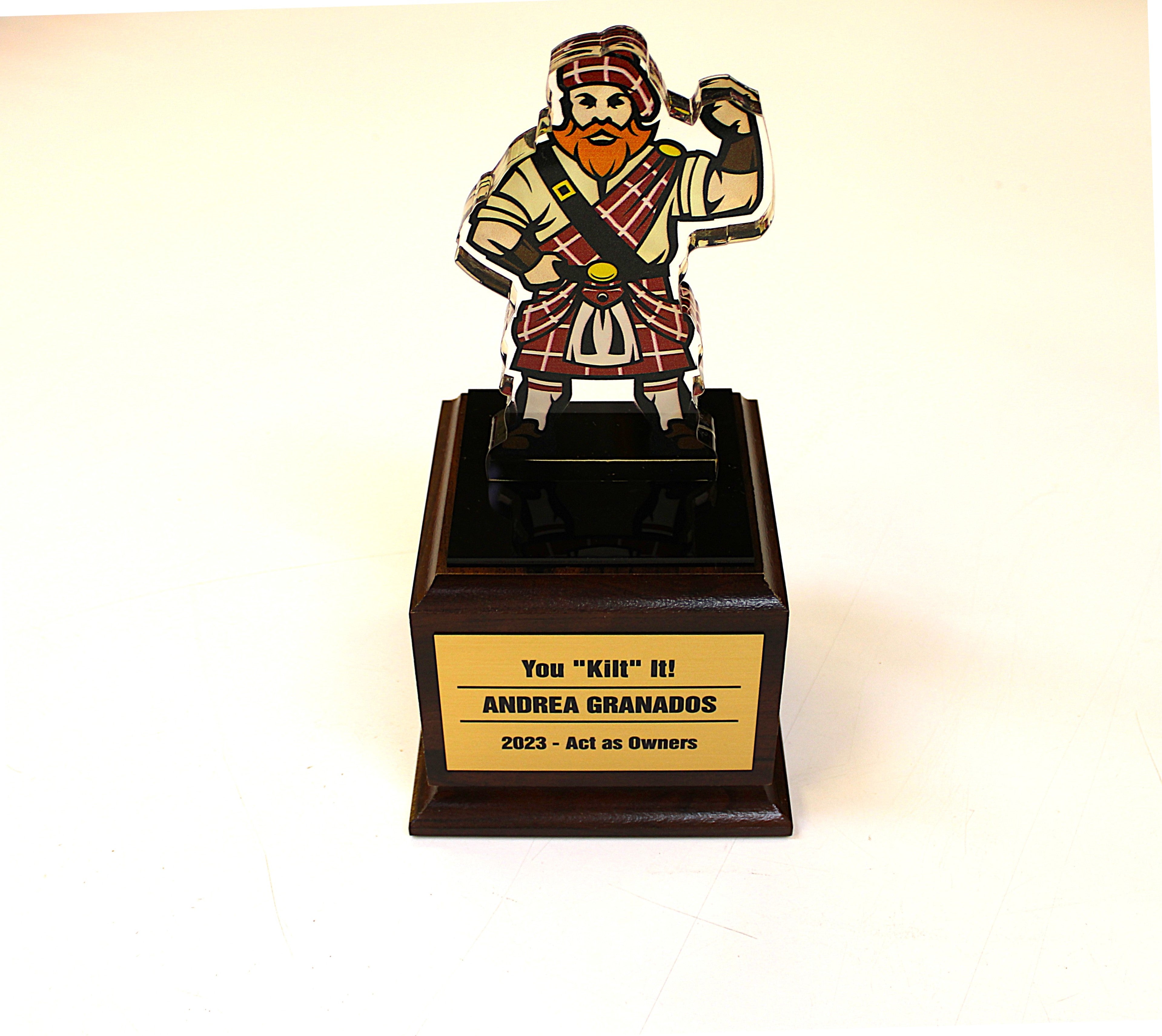 Lucite acrylic award as a Deal Toy or Tombstone with corporate mascot.