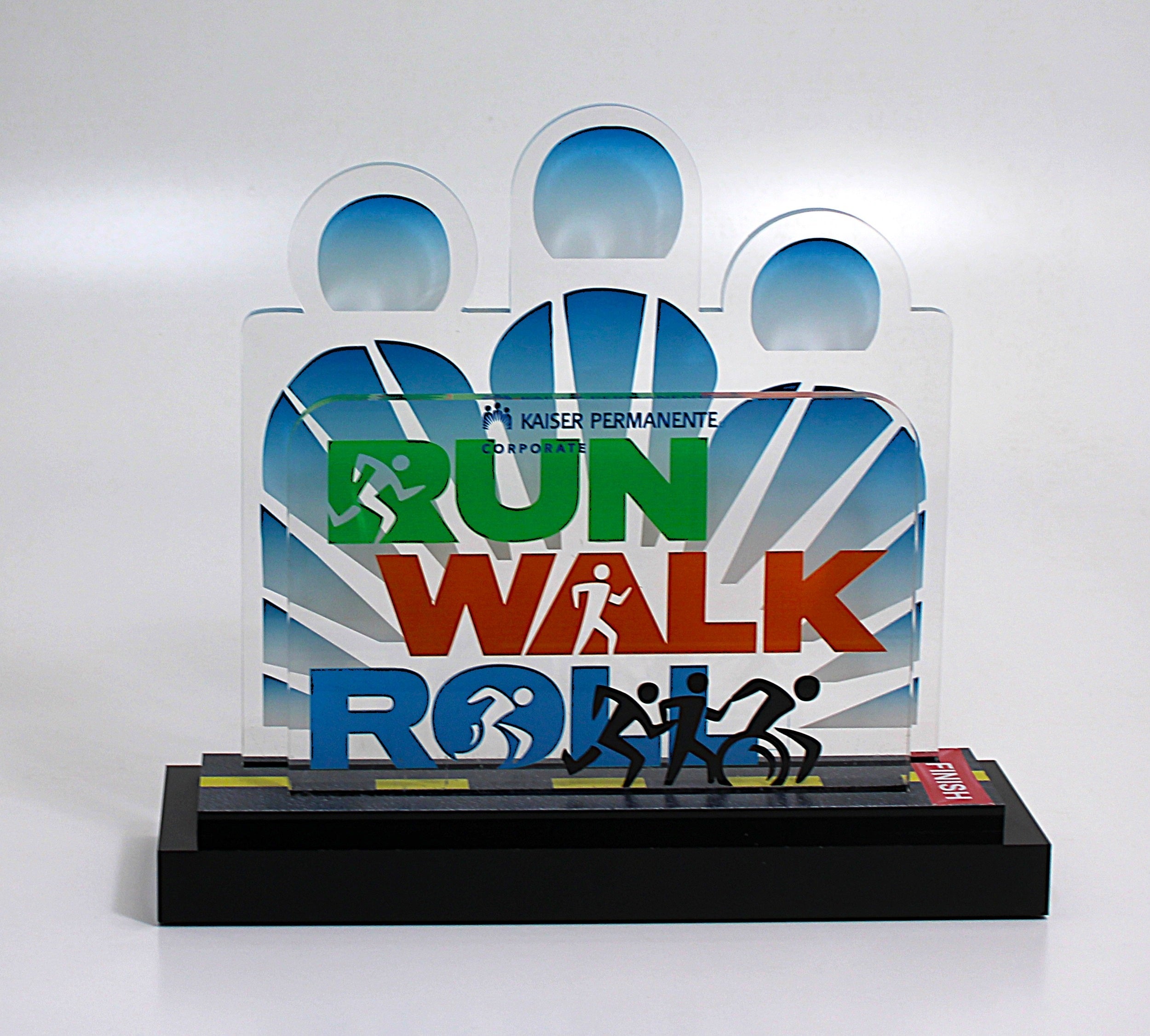 Custom acrylic Lucite award with Deal Tombstone engraved logo and text.