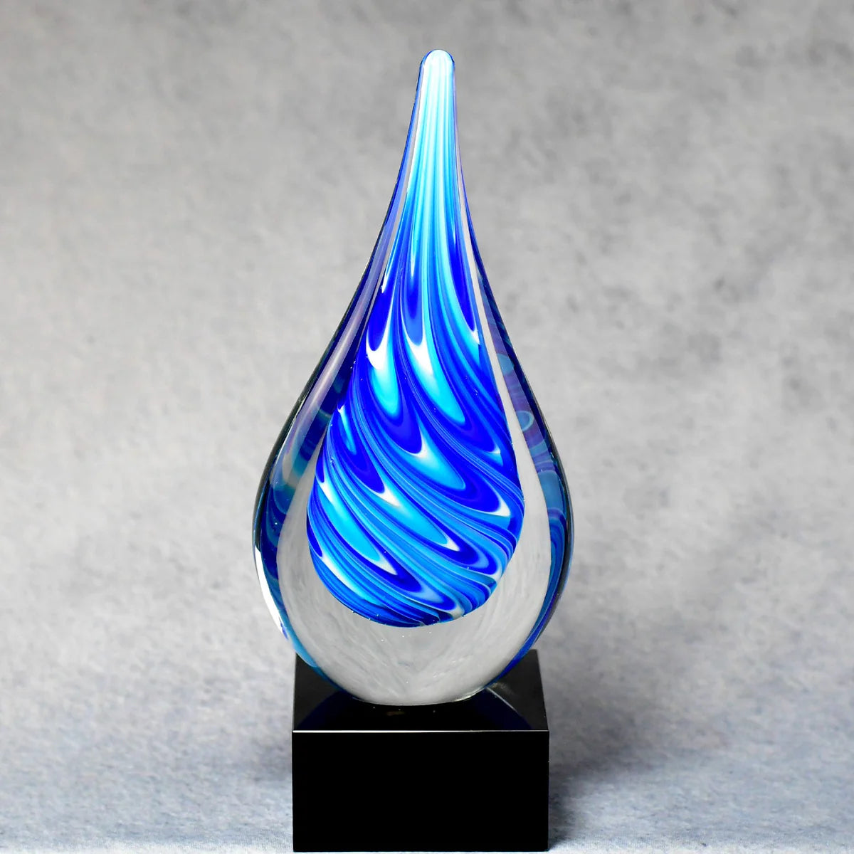 Blue and White Swirl Teardrop on Black Glass Base