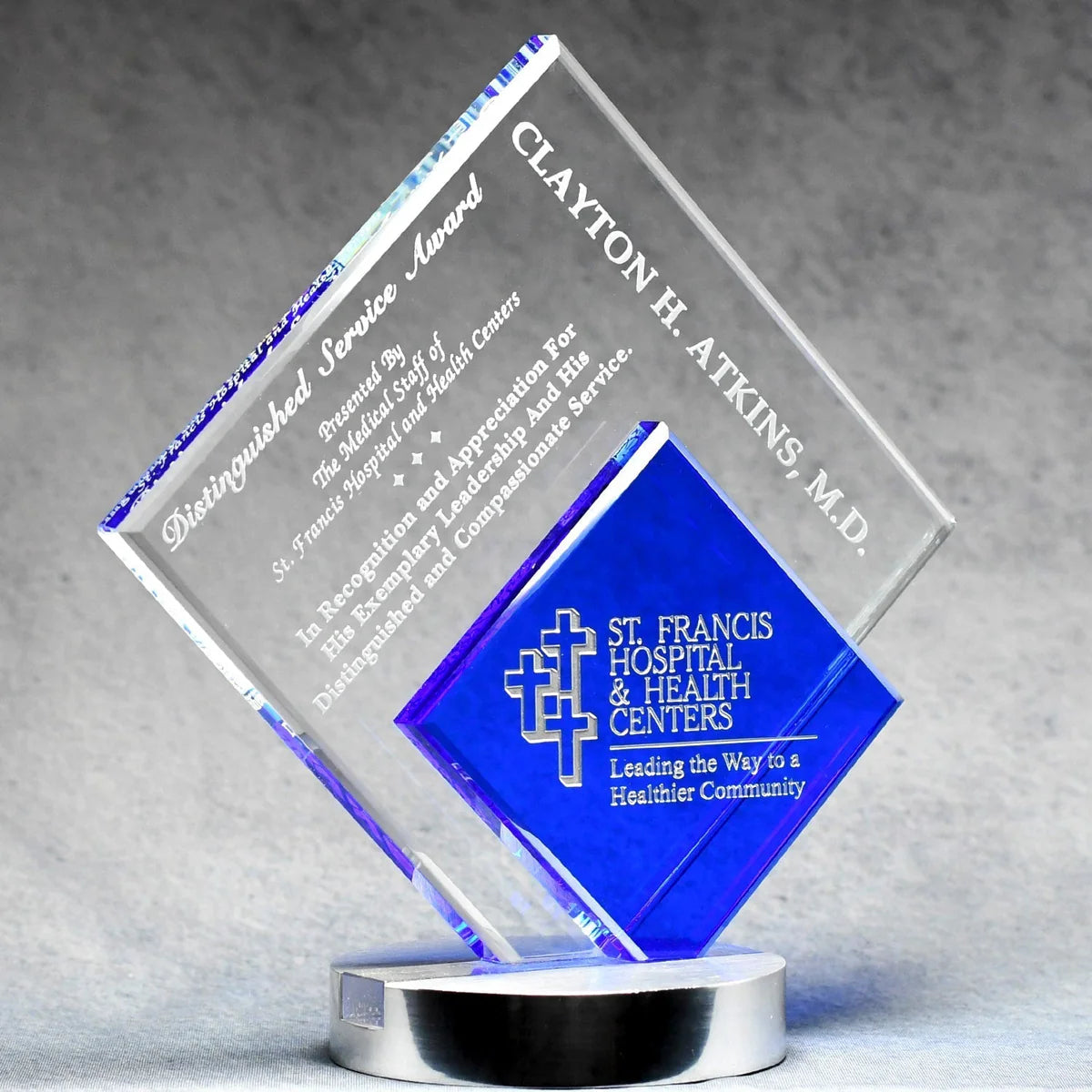 Crystal Glass award with sand etch engraved text and St. Francis Hospital & Health Centers logo color filled silver