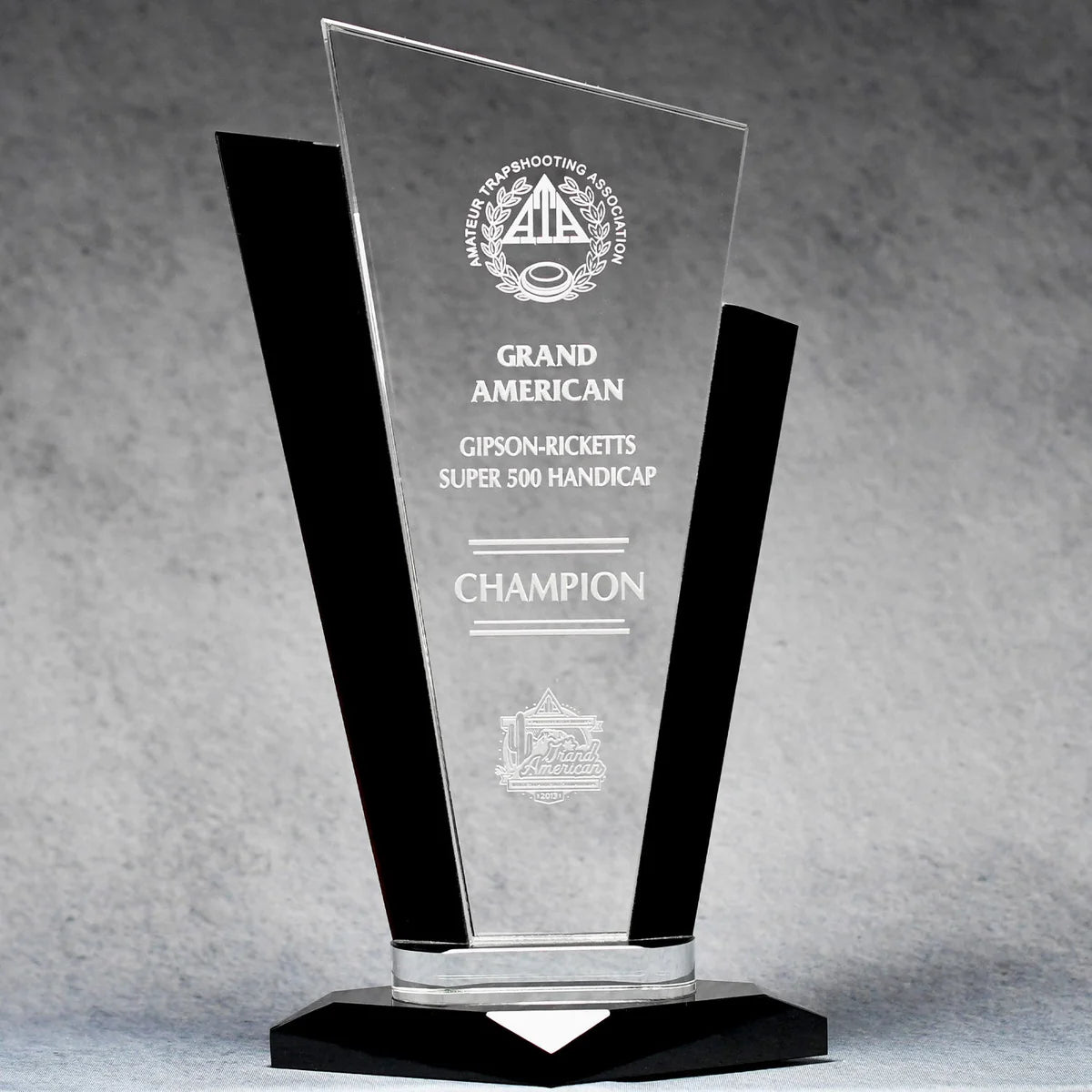 elegant OPTIC CRYSTAL TUXEDO PALACE AWARD with sand etch personalization text and logo with white color fill for contrast