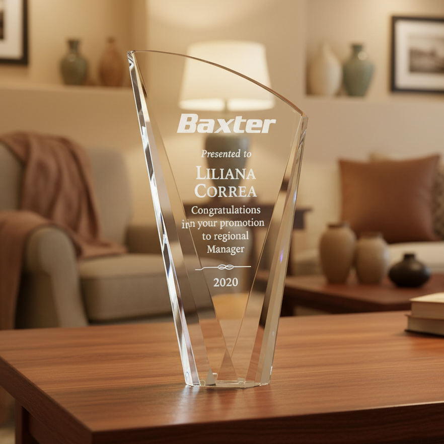 Crystal Sail award with 'Baxter' branding on a wooden table in a living room setting