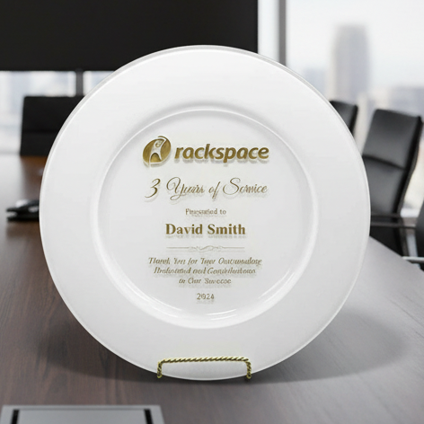 Rackspace service award for 3 years of service on a white plate with a stand.