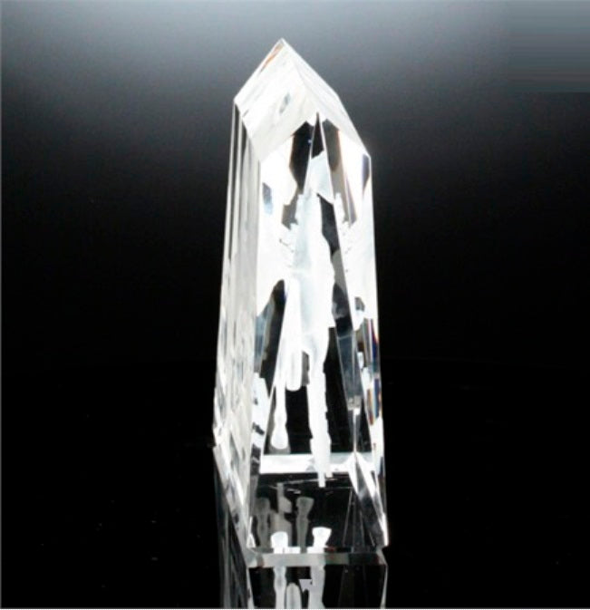 Clear crystal object on a black background