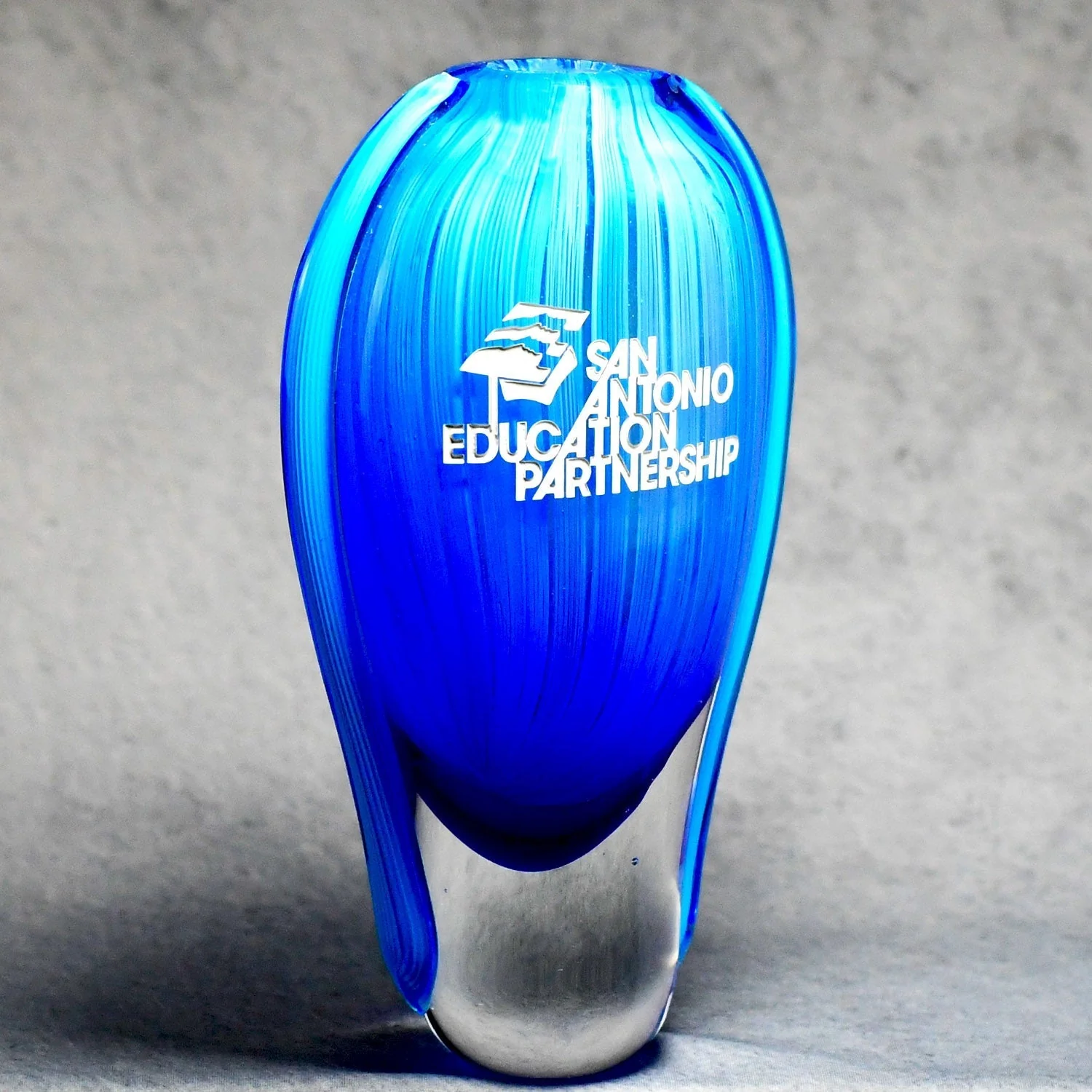 Hand Blown Blue glass vase with sand etch color filled white logo