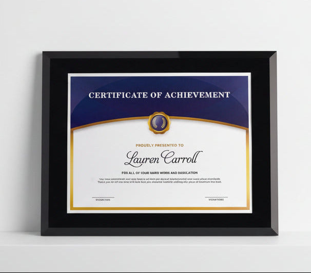 Framed certificate of achievement with a blue border and black frame on a light gray background