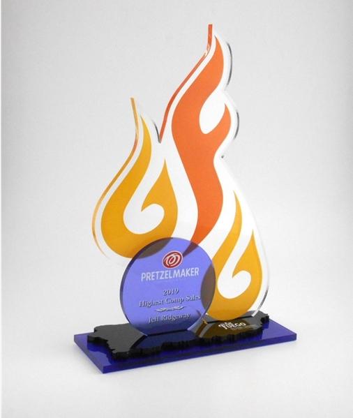 Atlanta Custom designed and shaped awards in clear acrylic. One of a kind deal toy trophy