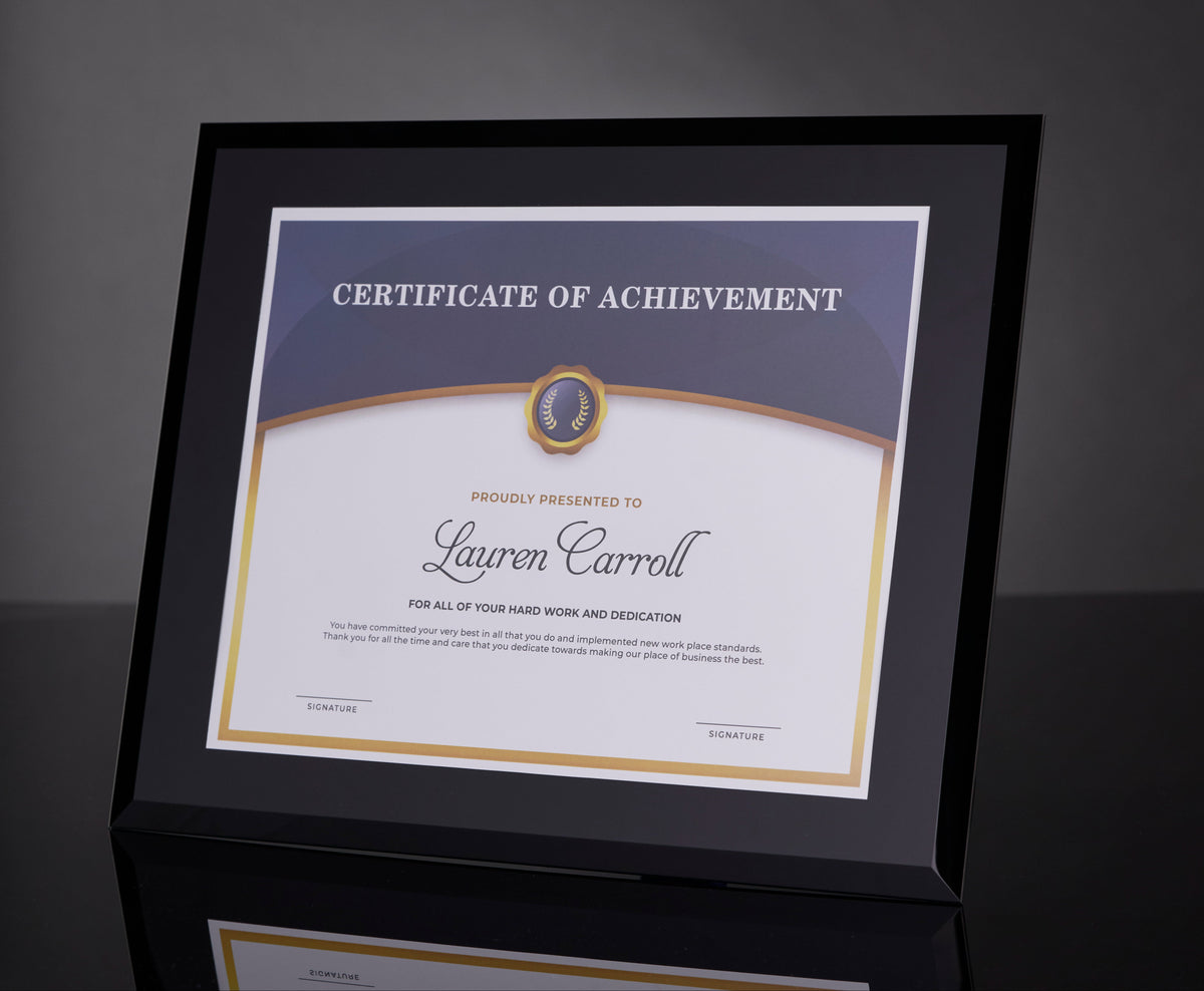 Framed certificate of achievement with a dark background