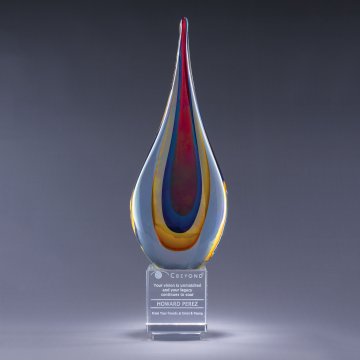 Colorful flame like teardrop glass award on crystal base with sand etch engraved text and logo