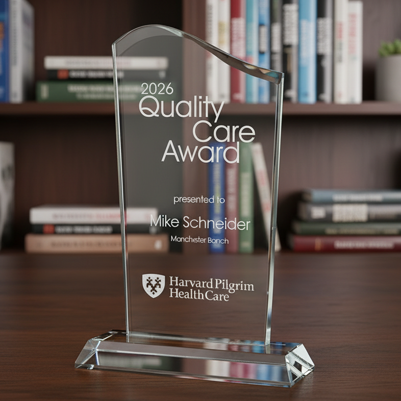 Glass award for with engraved text and corporate logo
