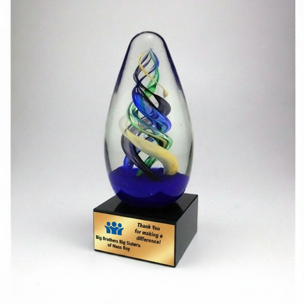 ART GLASS EGG ON BLACK GLASS BASE