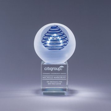 Crystal award with spherical blue design on crystal base with sand etch engraving