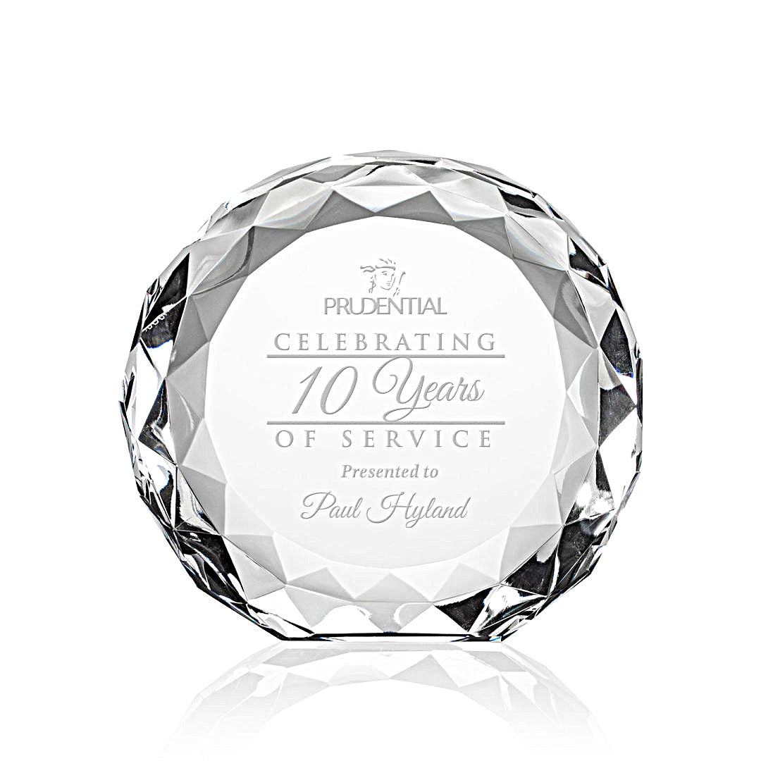 Optic clear faceted crystal awards each sand etch engraved with recognition language such as 'Celebrating 20 Years of Service'.
