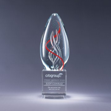 Clear glass award with red and clear interior spires with sand etched engraving on crystal base