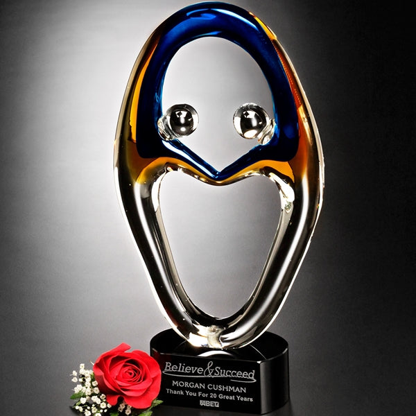 ART GLASS SCULPTURE TROPHY WITH BLACK MARBE BASE AND SAND ETCH ENGRAVNG